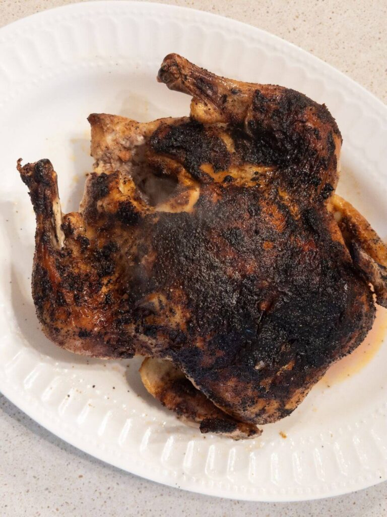 Roasted Chicken on a White Platter fully cooked